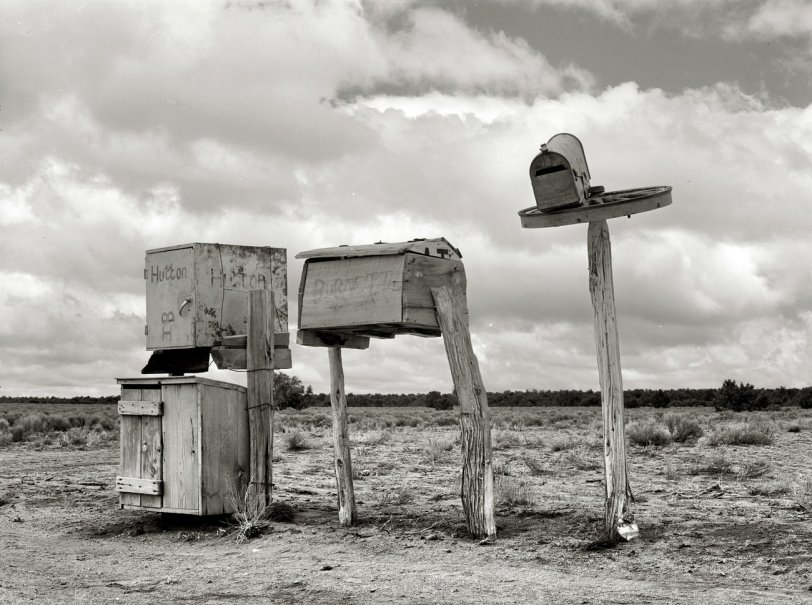 April 1940. "Mailboxes in Catron County, New Mexico." View full size. Medium format safety negative by Russell Lee for the Farm Security Administration.