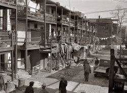 Washington tenements, Nov. 1935.  View full size. Photo by Carl Mydans.