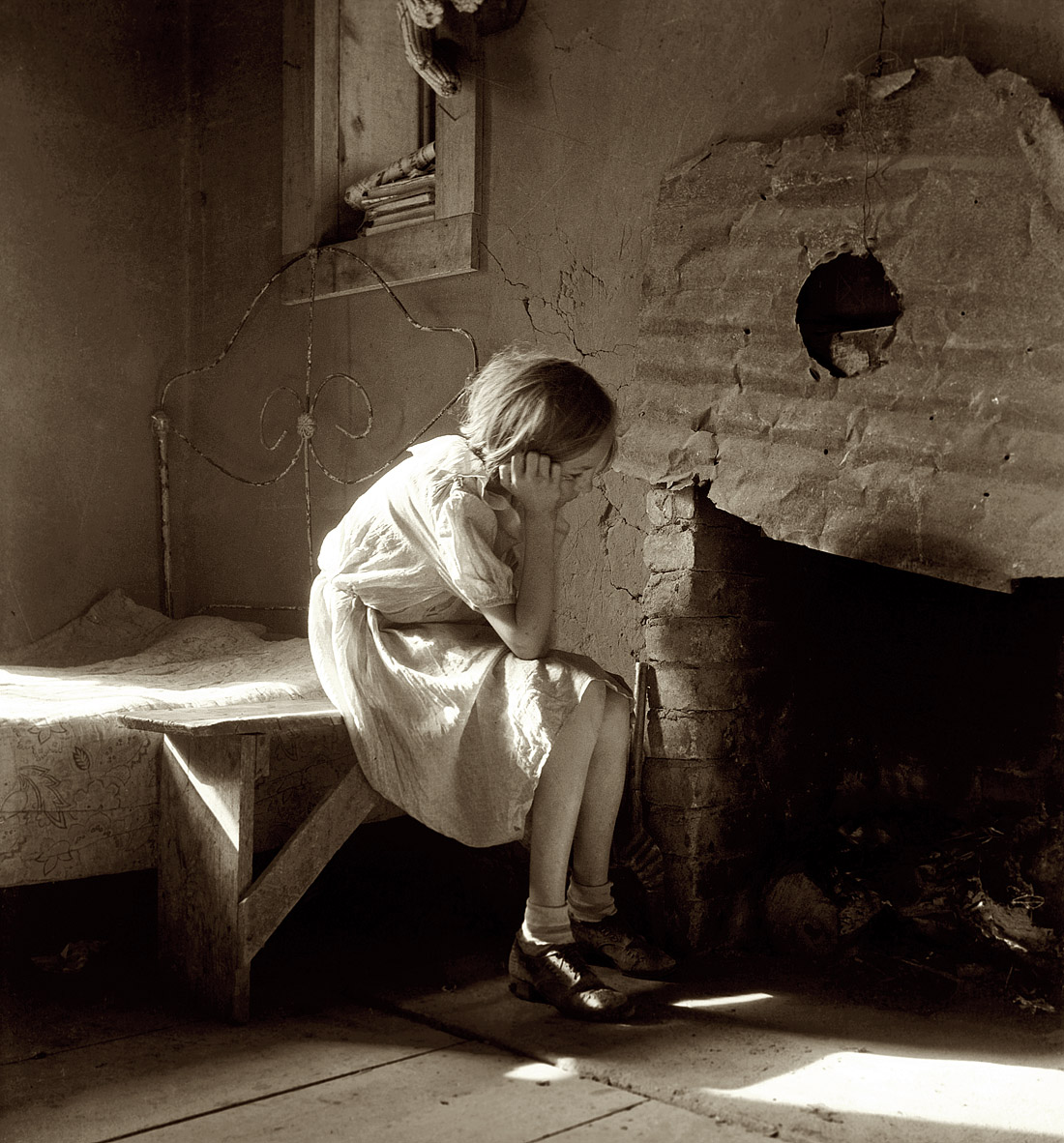 December 1935. "Resettled farm child. From Taos Junction to Bosque Farms project, New Mexico." View full size.  Medium-format nitrate negative by Dorothea Lange for the Resettlement Administration.