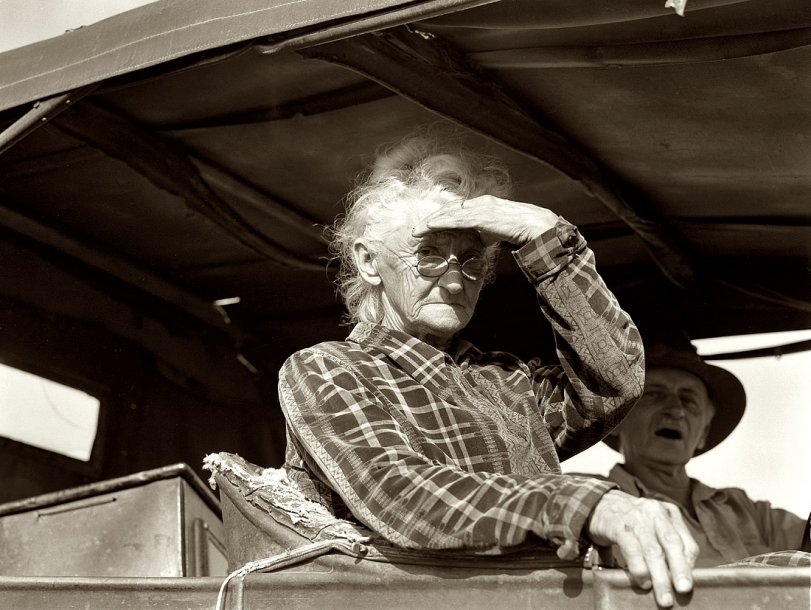 November 1936. Eighty-year-old woman living in squatters' camp on the outskirts of Bakersfield, California. "If you lose your pluck you lose the most there is in you -- all you've got to live with." View full size.  Medium-format nitrate negative by Dorothea Lange for the Farm Security Administration.