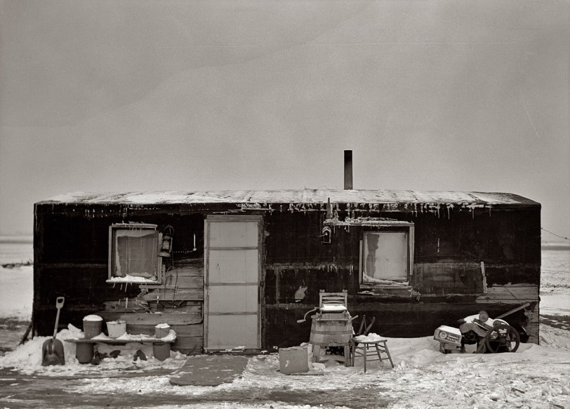 Photo of: Full House: 1936 -- November 1936 near Dickens, Iowa. Three-room shack, the residence of L.H. Nissen, hired man for a tenant farmer. Farm is owned by a loan company. Ten people live in the shack: mother, father, seven children, one grandchild. Medium format negative by Russell Lee, Resettlement Administration. View full size.