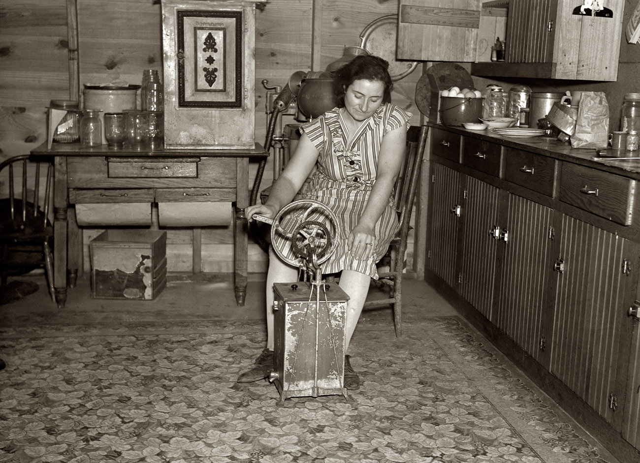 December 1936. "Farmer's wife churning butter. Emmet County, Iowa." Medium-format nitrate negative by Russell Lee. View full size.