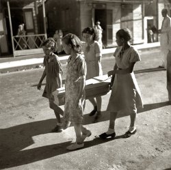 January 1938. "Ponce, Puerto Rico. Funeral of a child." View full size. Medium format nitrate negative by Edwin Rosskam for the Farm Security Administration.