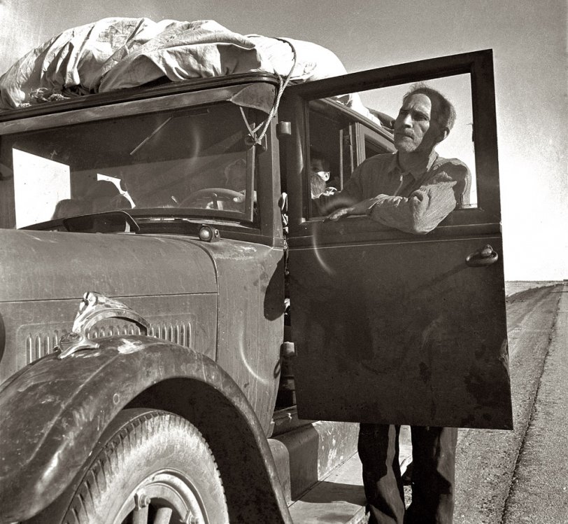 March 1937. Stalled in the Southern California desert. "No money, ten children. From Chickasaw, Oklahoma." View full size.  Medium-format nitrate negative by Dorothea Lange for the Farm Security Administration.
