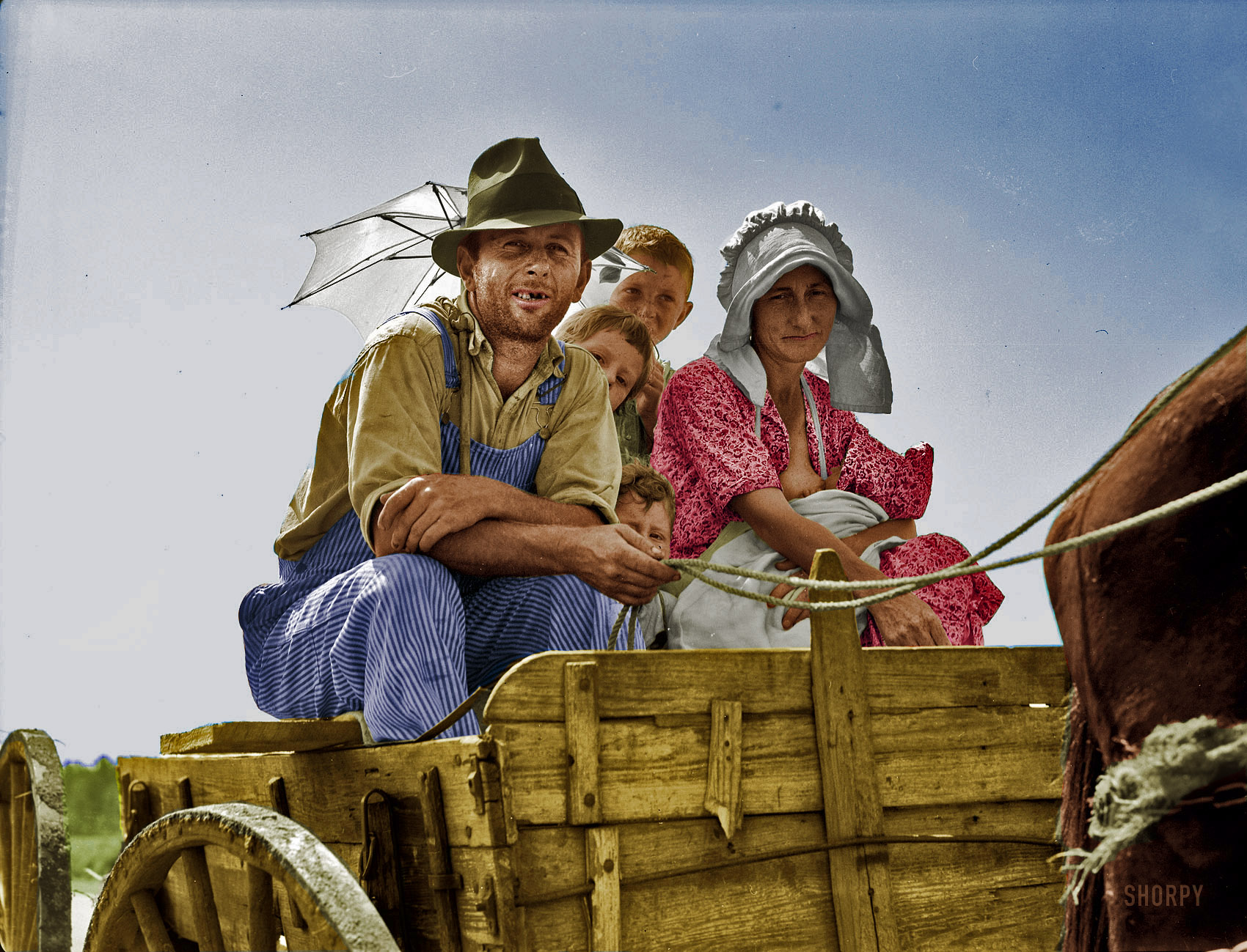 Colorized version of Minivan 1937. They look a lot better off in color. View full size.