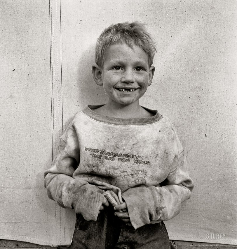 November 1938. "Migrant cotton picker's child who lives in a tent in the government camp instead of along the highway or in a ditch bank. Shafter Camp, California." Medium format nitrate negative by Dorothea Lange. View full size.  
