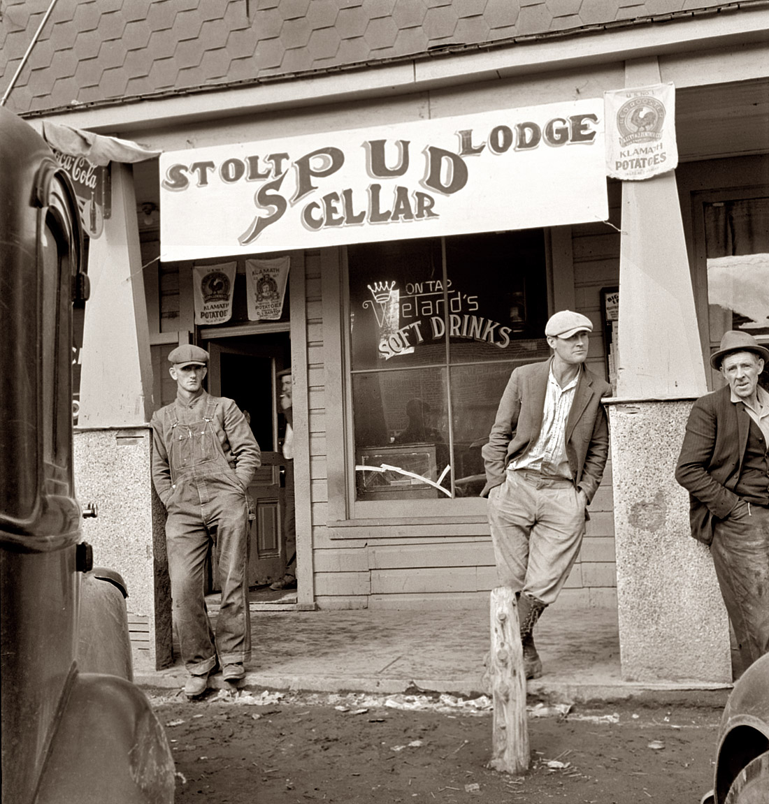 October 1939. Tavern on main street of potato town during harvest season. Merrill, Oregon. View full size. Photograph by Dorothea Lange.