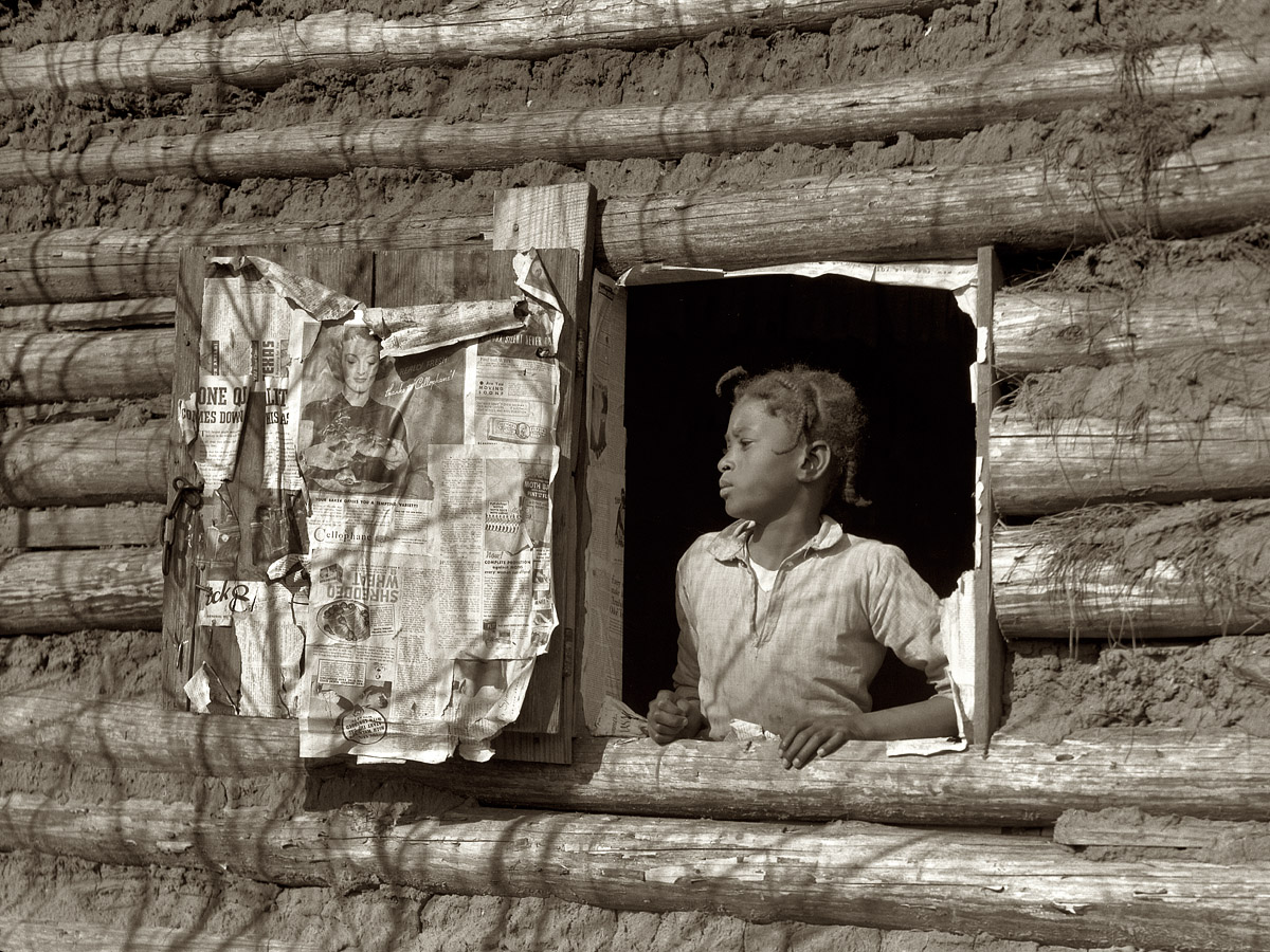 April 1937. "Girl at Gee's Bend. Descendants of slaves of the Pettway family are still living very primitively on the plantation." Wilcox County, Alabama. Medium format nitrate negative by Arthur Rothstein for the FSA. View full size.