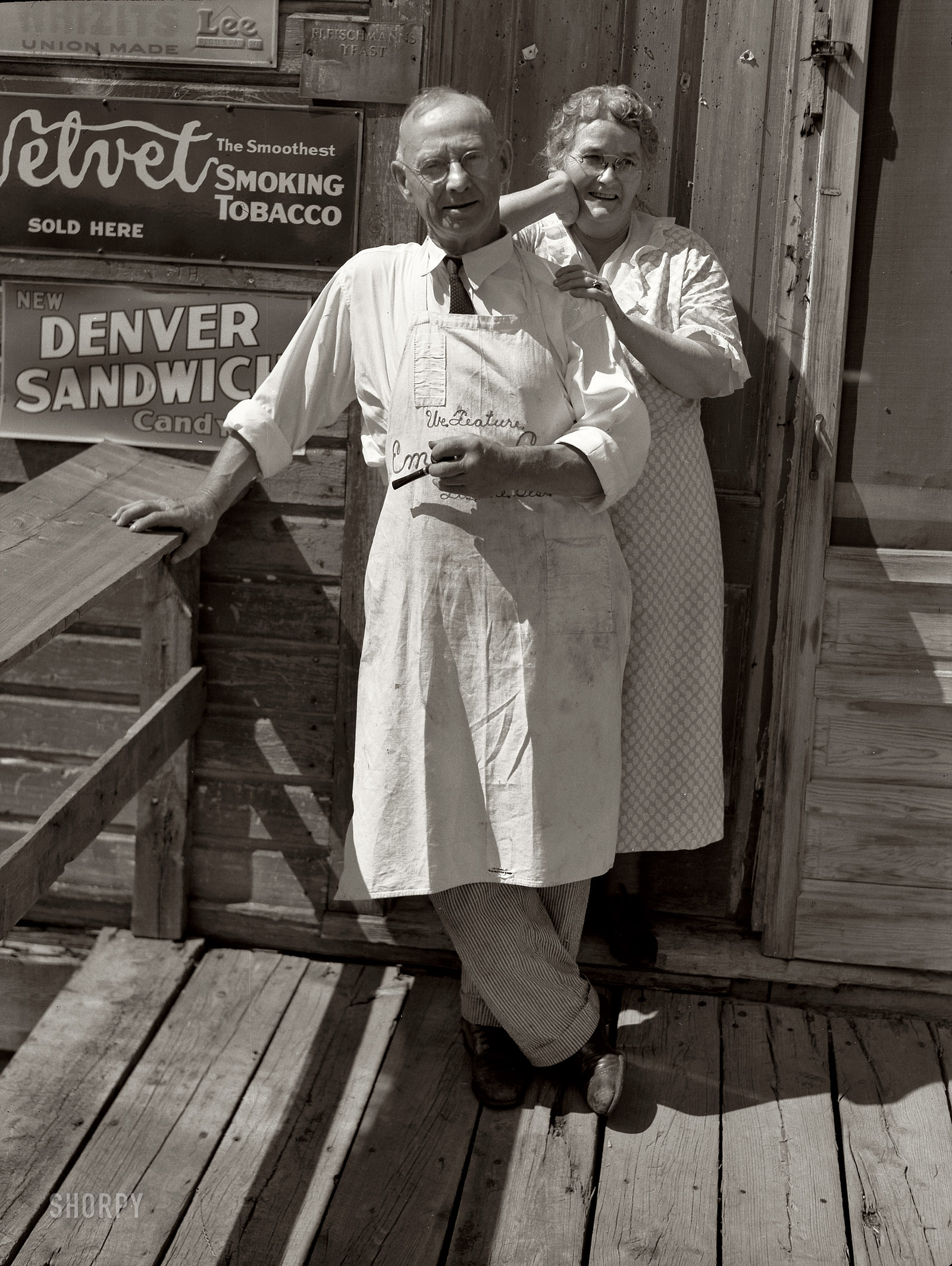 August 1937. "Storekeeper and wife in front of their store at Section 30. 'Bust' iron mining town near Winton, Minnesota." Medium format nitrate negative by Russell Lee for the Resettlement Administration. View full size.