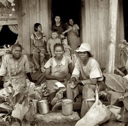 August 1936. "Migrant cotton pickers at lunchtime. Near Robstown, Texas." Medium-format nitrate negative by Dorothea Lange. View full size.