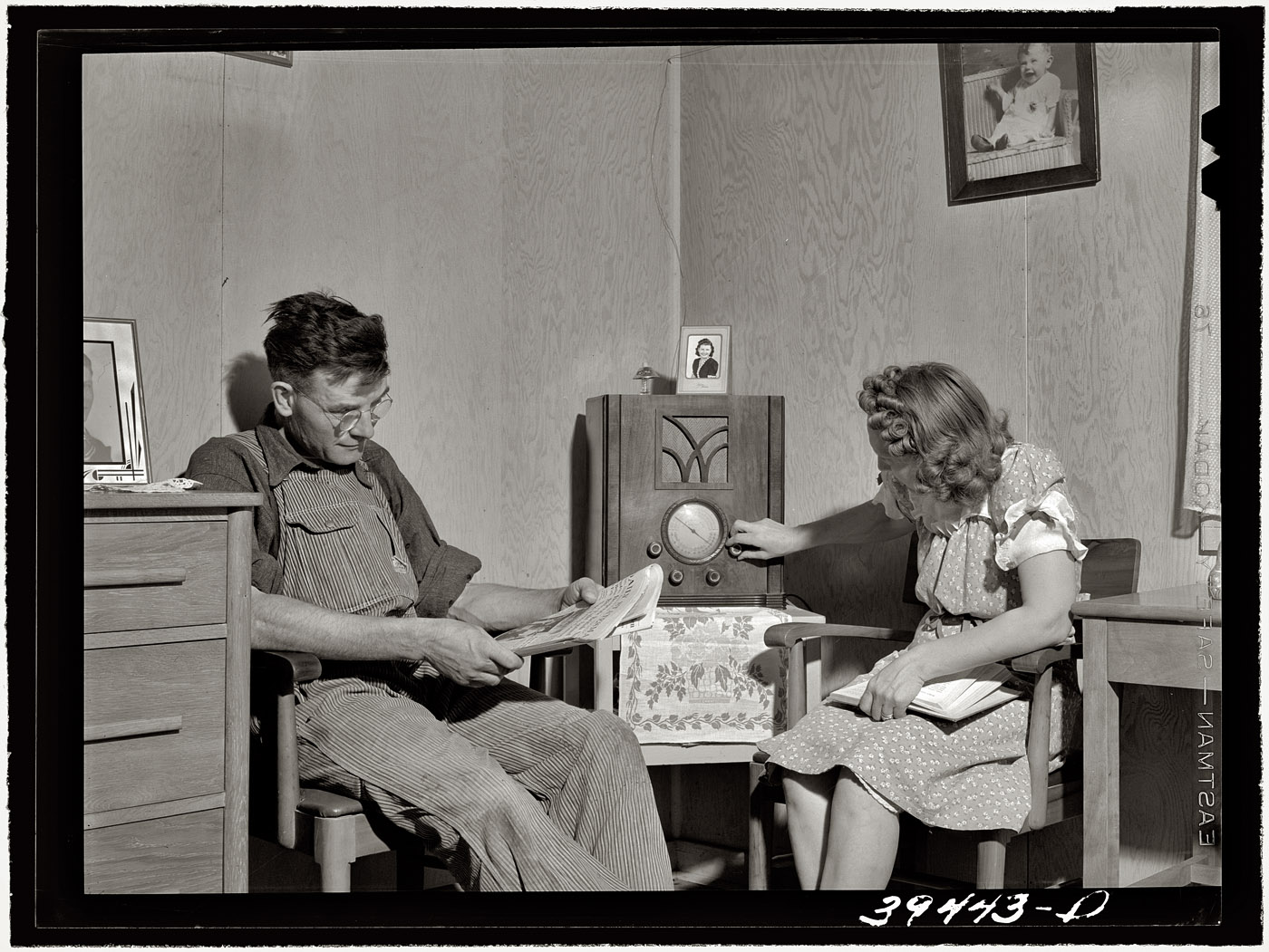 June 1941. Family at the "USDA farm family labor camp" in Caldwell, Idaho. View full size. Medium format safety negative by Russell Lee for the FSA.
