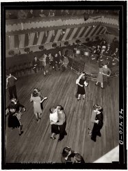 1938. Maher's Dance Hall in Shenandoah, Pennsylvania, showing orchestra platform and dancers. (Note the stag line and that two of the couples are girl-girl.) View full size. 3x4 safety negative by Sheldon Dick. Twelve years after this picture was taken, the photographer, son of mimeograph magnate A.B. Dick, would meet a violent end along with his wife in a tragic murder-suicide.