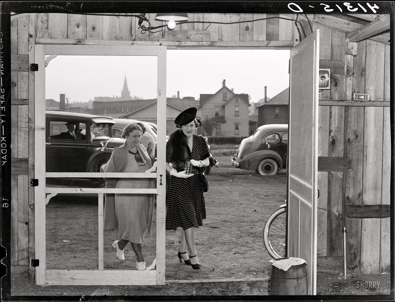 September 1940. "Customers entering Tri-County Farmers Co-op Market in Du Bois, Pennsylvania." Medium-format negative by Jack Delano. View full size.