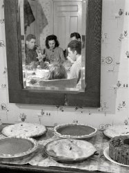 November 28, 1940. "Pumpkin pies and Thanksgiving dinner at the home of Mr. Timothy Levy Crouch, a Rogerene Quaker living in Ledyard, Connecticut." Photo by Jack Delano for the Farm Security Administration. View full size.