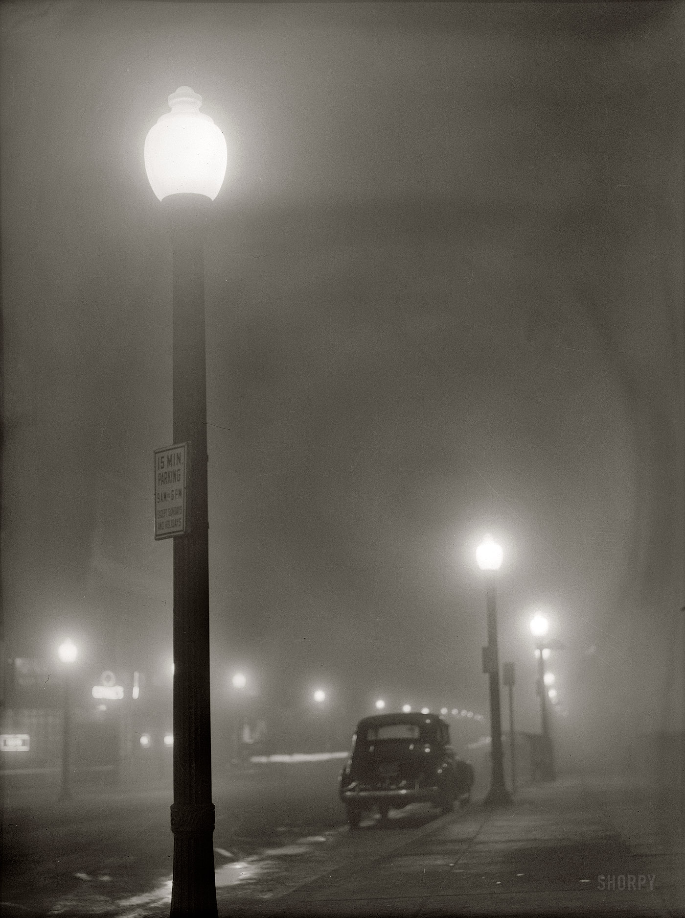 January 1941. "Foggy night in New Bedford, Massachusetts." Medium-format safety negative by Jack Delano. Office of War Information. View full size.