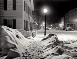 March 1940. "Center of town. Woodstock, Vermont. Snowy night." Medium format acetate negative by Marion Post Wolcott. View full size.