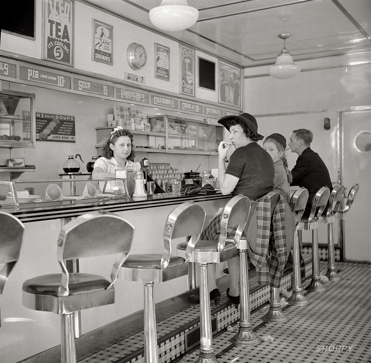 October 1941. "White Tower hamburger stand, the popular place in Amsterdam, New York." View full size. Medium-format nitrate negative by John Collier.
