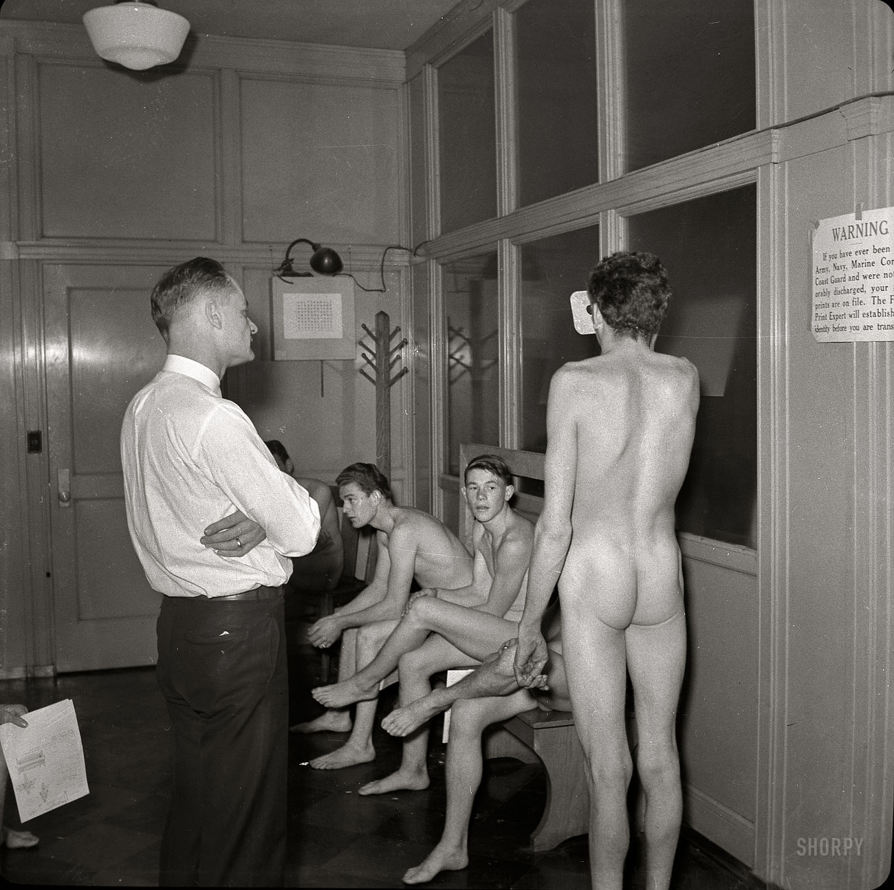 "December 1941. Enlisting in the Marines. Recruiting office, San Francisco." Nitrate negative by John Collier, Office of War Information. View full size.
