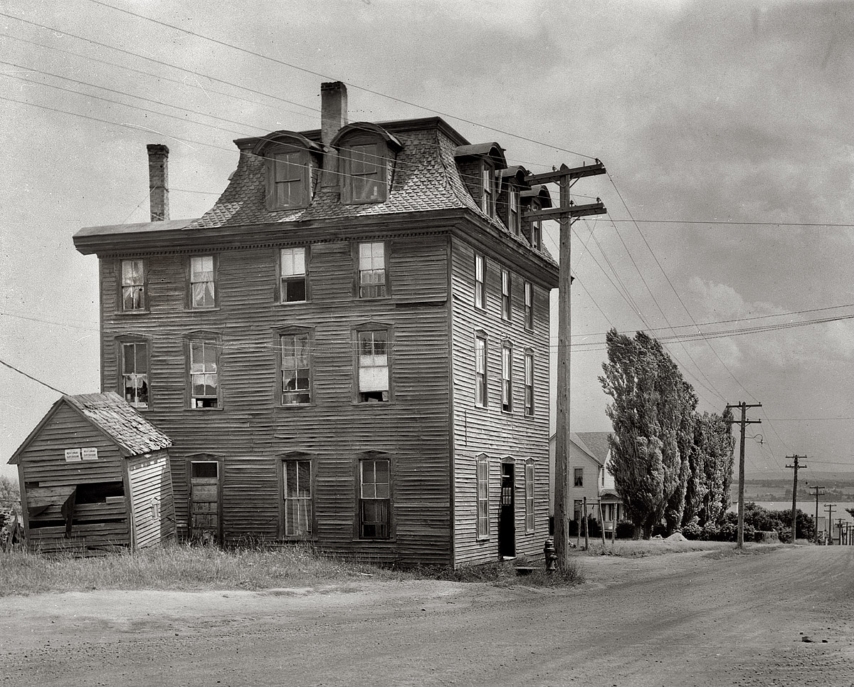 August 1941. "Boardinghouse in Baraga, Michigan," a.k.a. the Honeymoon Hotel. View full size. Medium format safety negative by John Vachon for the FSA. This was scanned from an uncaptioned and somewhat misfiled print of the negative. Thanks to Anonymous Tipster for pointing us in the right direction (north).