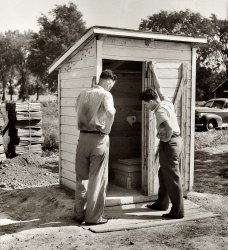 1941. "Completed sanitary privy in Minnesota being inspected by farmer and engineer of Farm Security Administration." View full size. Medium format safety negative by Shipman for the Farm Security Administration.
