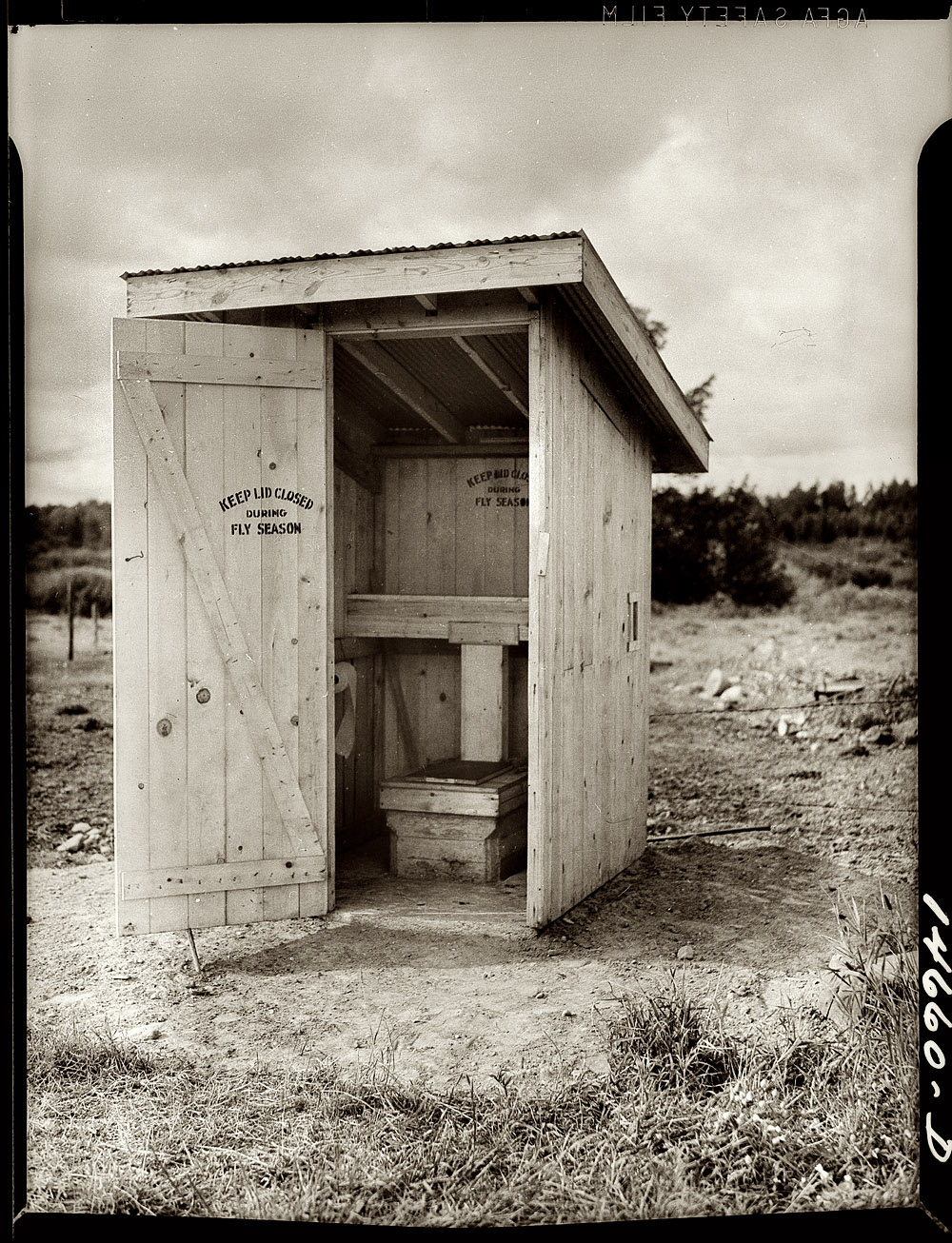 Minnesota, 1941. "Complete sanitary privy properly protected to prevent flies from spreading diseases. Concrete floor slab, riser stool and building are fabricated at central yard for environmental sanitation program." View full size. Medium format safety negative by Shipman for the Farm Security Administration.