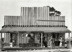 January 1936. "Store with false front. Vicinity of Selma, Alabama." 8x10 nitrate negative by Walker Evans for the Farm Security Administration. View full size.