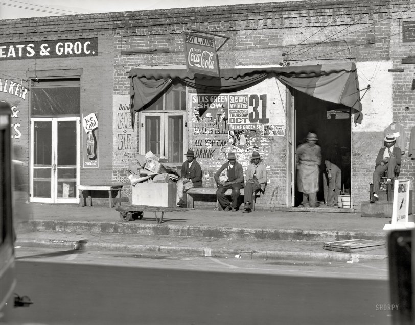 December 1935. "Sidewalk scene in Selma, Alabama." 8x10 inch nitrate negative by Walker Evans for the Resettlement Administration. View full size.
