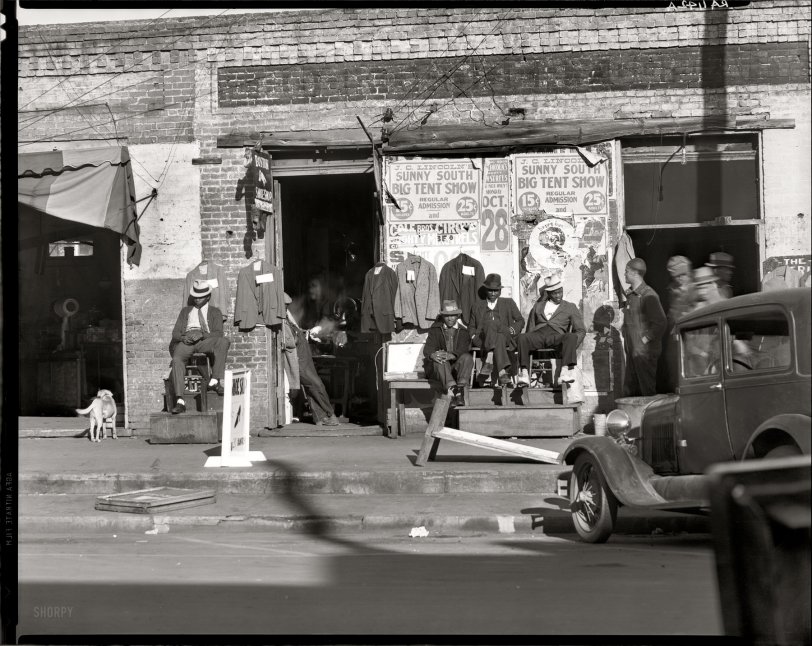 December 1935. "Sidewalk scene in Selma, Alabama." Large-format nitrate negative by Walker Evans for the Resettlement Administration. View full size. 
