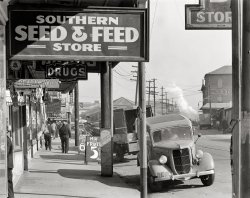 December 1935. "Waterfront in New Orleans. French market sidewalk scene." Large-format nitrate negative by Walker Evans for the FSA. View full size.