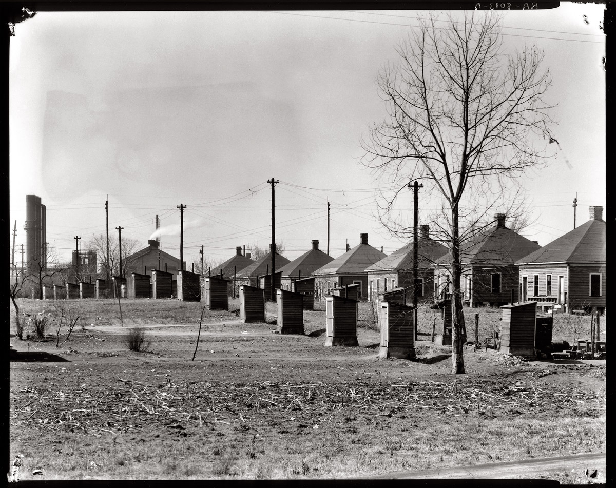 March 1936. "Workers' company houses and outhouses. Republic Steel, Birmingham, Alabama." 8x10 inch nitrate negative by Walker Evans. View full size.