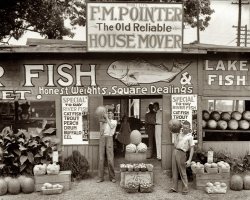 Summer 1936. Roadside stand near Birmingham, Alabama. View full size.  Medium-format negative by Walker Evans for the Farm Security Administration.