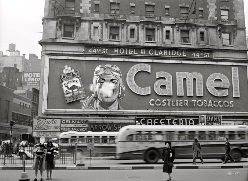 February 1943. "New York. Camel cigarette advertisement at Times Square." Photograph by John Vachon for the Office of War Information. View full size.
