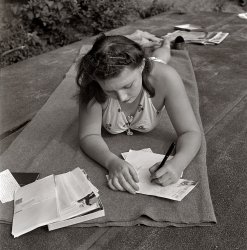 August 1942. "National music camp at Interlochen, Michigan, where 300 or more young musicians study symphonic music for eight weeks each summer. Writing to the boyfriend back home." View full size. Medium-format nitrate negative by Arthur Siegel for the Farm Security Administration.