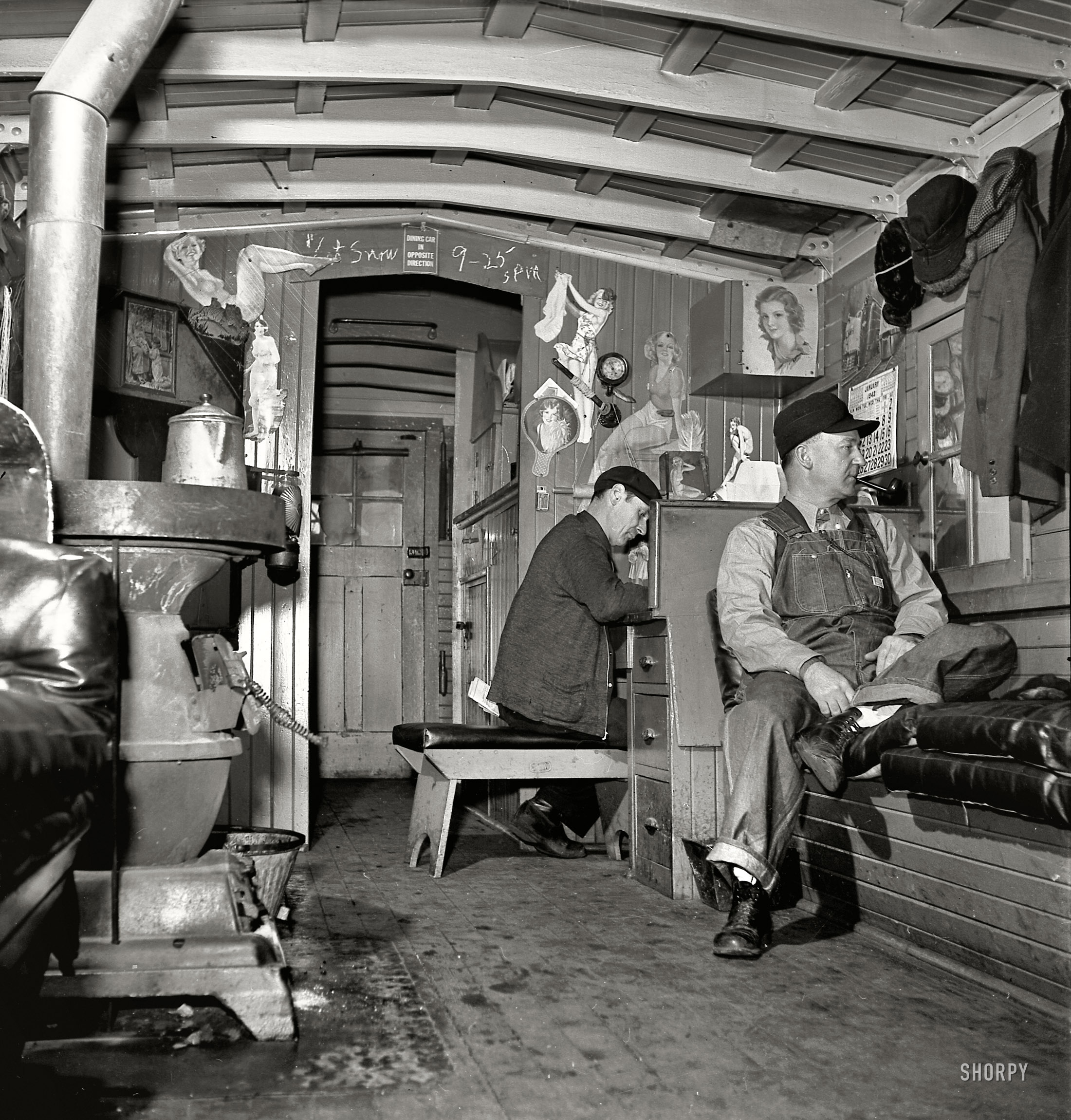 January 1943. "Freight train operations on the Chicago and Northwestern Railroad between Chicago and Clinton, Iowa. The caboose is the conductor's second home. He always uses the same one and many conductors cook and sleep there while waiting for trains to take back from division points." Medium format nitrate negative by Jack Delano, Office of War Information. View full size.