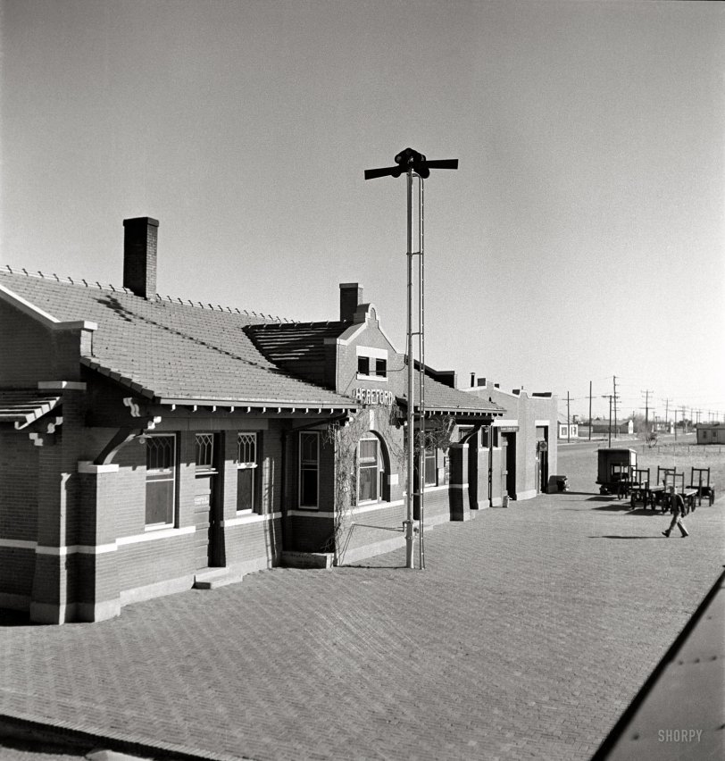 March 1943. "Hereford, Texas. Passing the depot on the Atchison, Topeka, and Santa Fe Railroad between Amarillo, Texas, and Clovis, New Mexico." Nitrate negative by Jack Delano for the Office of War Information. View full size.