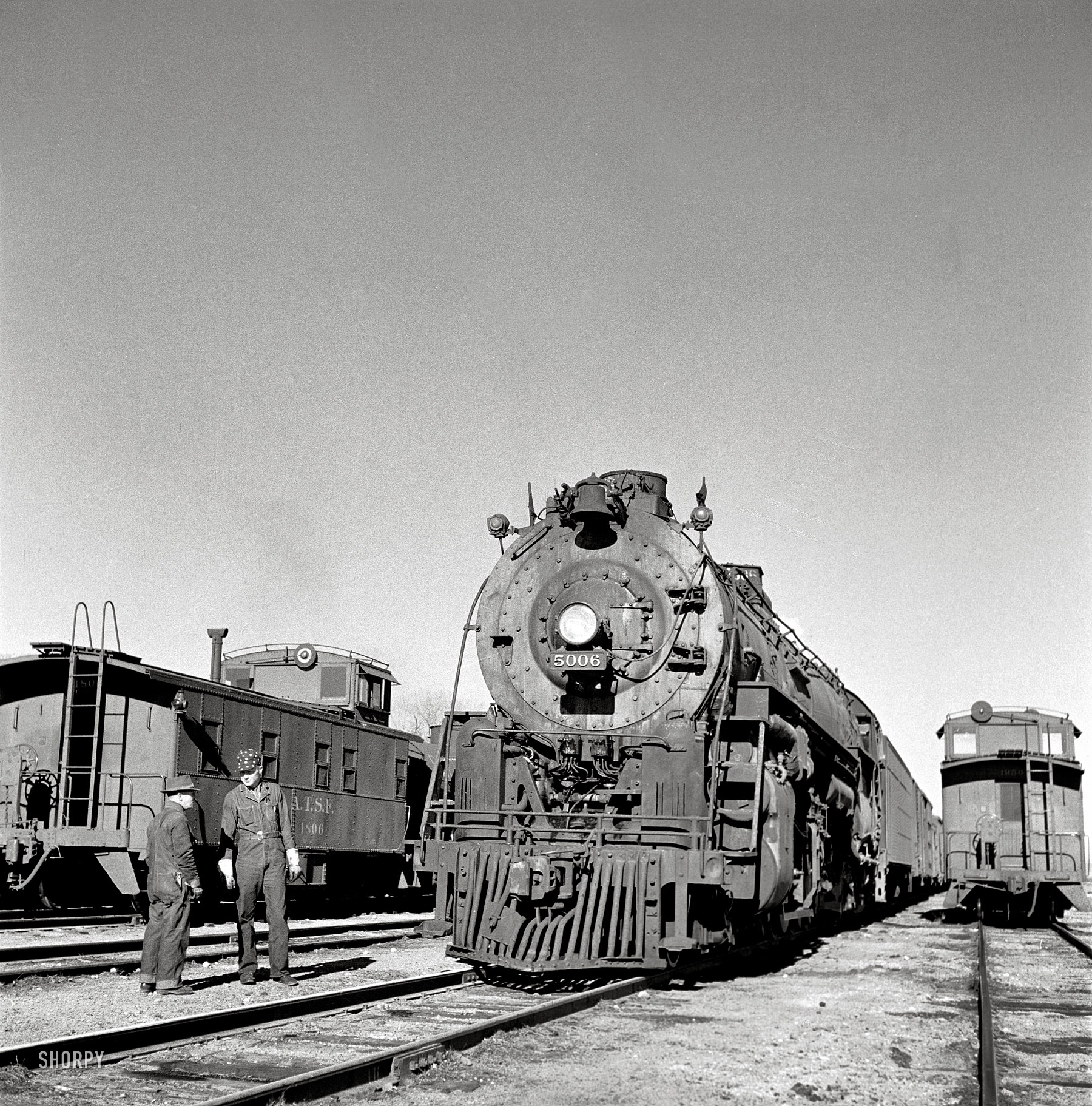 March 1943. Vaughn, New Mexico. "Eastbound train about to leave the Atchison, Topeka and Santa Fe yard on the return trip." Medium-format nitrate negative by Jack Delano for the Office of War Information. View full size.