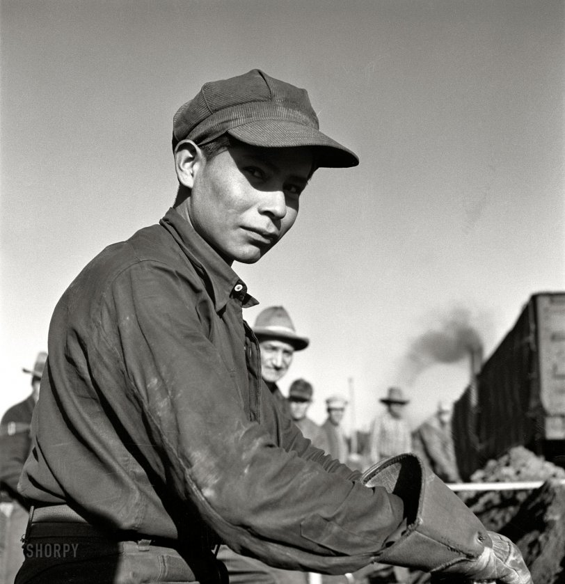 March 1943. "Winslow, Arizona. Young Indian laborer working in the Atchison, Topeka and Santa Fe yards." Medium-format nitrate negative by Jack Delano for the Office of War Information. View full size.
