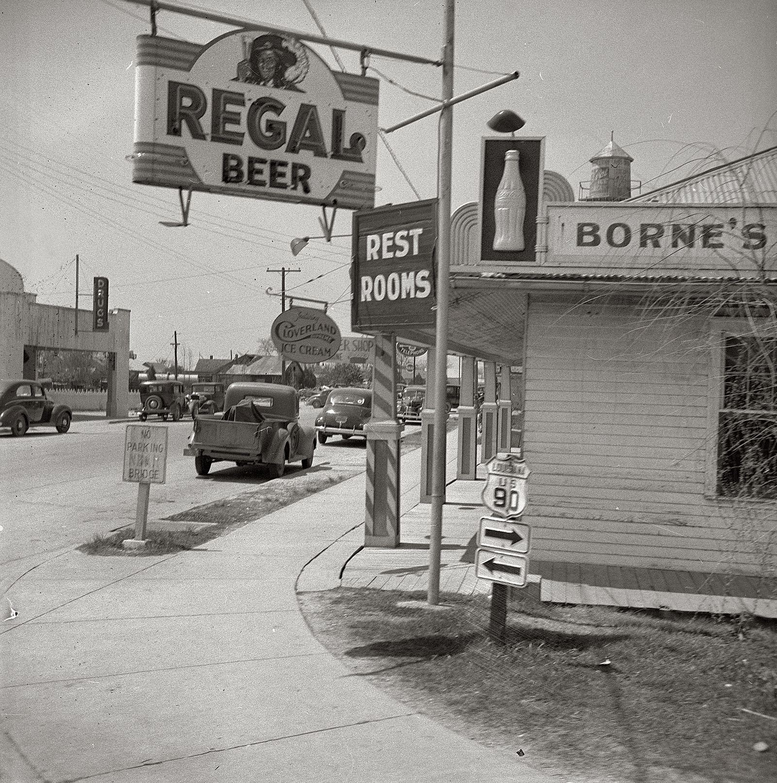 March 1943. "Raceland, Louisiana. U.S. Highway 90." View full size. Medium format nitrate negative by John Vachon for the Office of War Information.