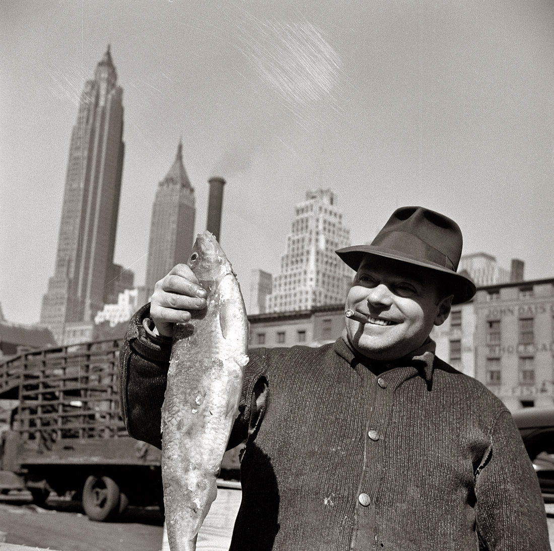 June 1943. Vendor at the Fulton Fish Market in New York City. View full size. Photograph by the legendary Gordon Parks, back when he was just starting out.