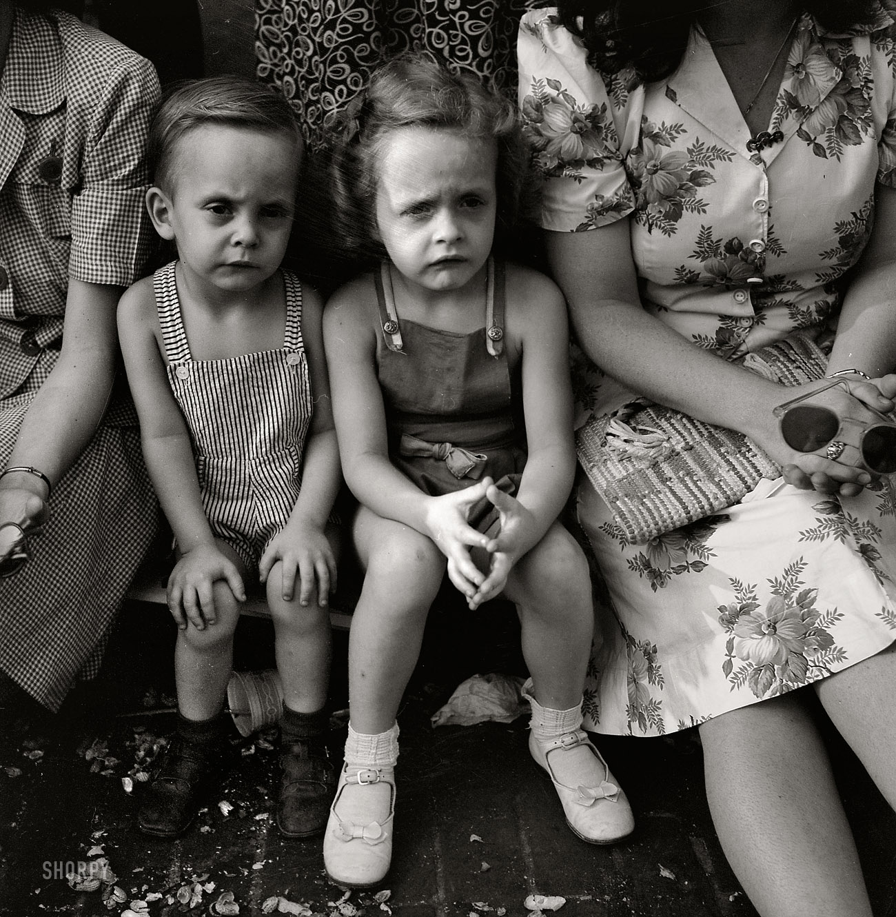 Washington, D.C. July 1943. "Spectators at the parade to recruit civilian defense volunteers." Medium-format negative by Esther Bubley, OWI. View full size.