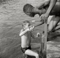 August 1943. "Southfields, New York. Interracial activities at Camp Nathan Hale, where children are aided by the Methodist Camp Service." Medium-format nitrate negative by Gordon Parks for the Office of War Information. View full size.