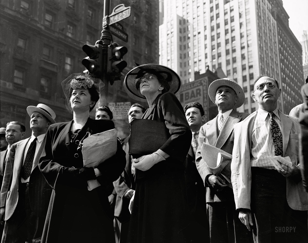 New York. June 6, 1944. ALLIED ARMIES LAND ON COAST OF FRANCE. GREAT INVASION OF CONTINENT BEGINS. "D-Day. Crowd watching the news line on the Times building at Times Square." Large-format nitrate negative by Howard Hollem or Edward Meyer, Office of War Information. View full size.