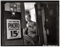 15-cent photo booth in the lobby at the United Nations service center at Washington, D.C. December 1943. View full size. Photograph by Esther Bubley.
