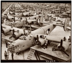 B-24 bomber assembly hall, location unspecified. April 1943. View full size.