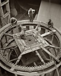 June 1942. "Installation of a third 30,000 kilowatt generator at the Tennessee Valley Authority's Cherokee Dam on the Holston River." View full size. Medium format safety negative by Arthur Rothstein for the Office of War Information.