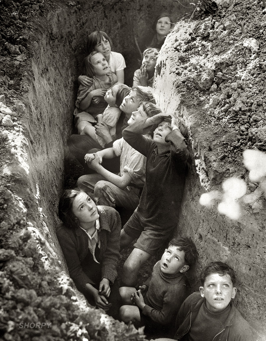 England, 1940-41. "Battle of Britain. Children in an English bomb shelter." British Information Service/U.S. Office of War Information. View full size.