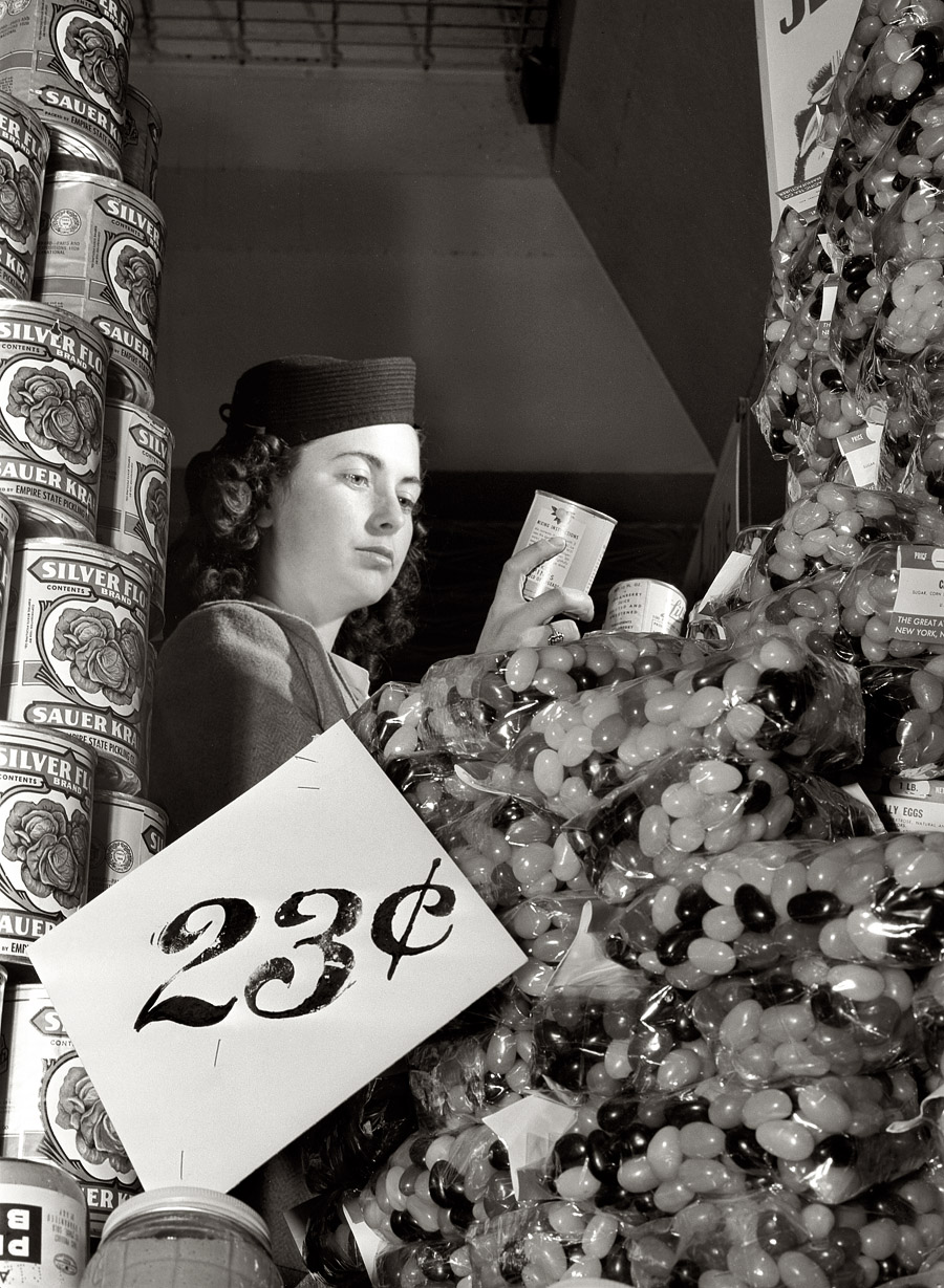 February 1942. "Don't let pretty labels on cans mislead you, but learn the difference between grades and the relative economy of buying larger instead of small cans. The Pure Food Law requires packers to state exact quantity and quality of canned products, so take advantage of this information and buy only after thorough inspection of labels." View full size. Medium format nitrate negative by Ann Rosener for the OWI. This woulda made a great Kodachrome.