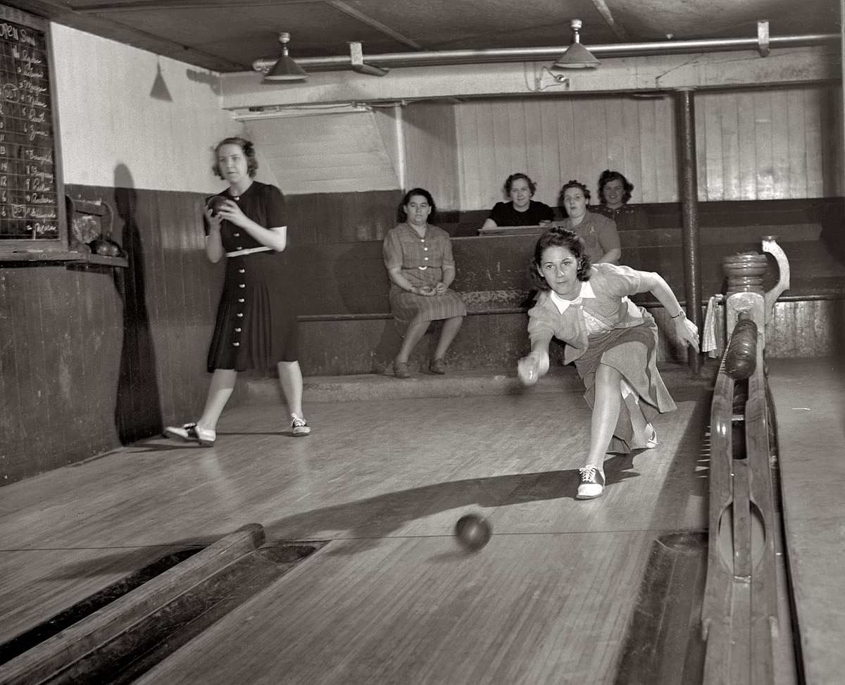 January 1942. Bantam, Connecticut. "In the basement of the town firehouse is the bowling alley, revenue from which helps to support the town's volunteer fire companies. Each night is alloted to a specific group, and there are several hot rivalries. Among the women shown here is Mrs. Winfield Peterson, whose husband is foreman of the Warren McArthur experimental shop." View full size. 5x7 nitrate negative by Howard R. Hollem for the Office of Emergency Management.