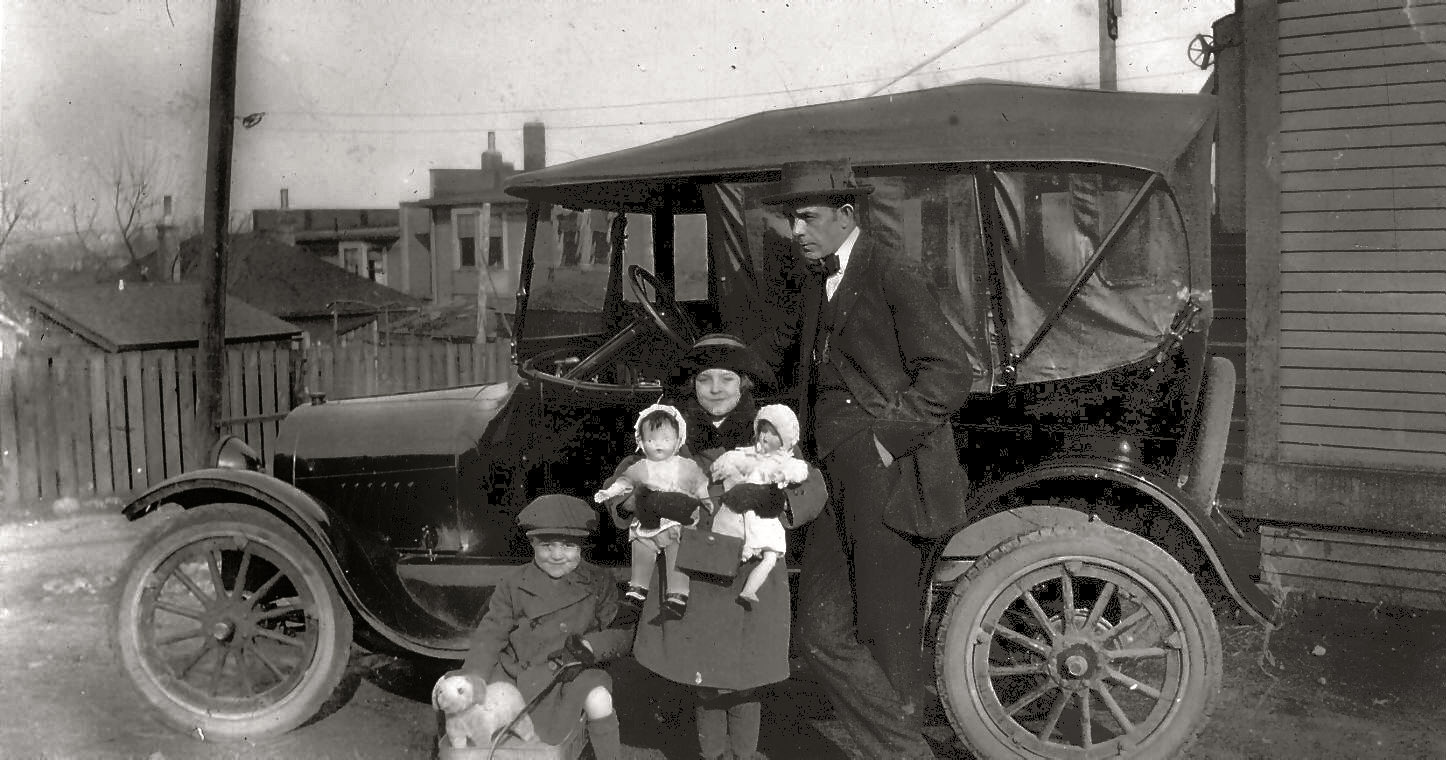 My grandfather (R) Tom I'Anson, my father (L) Tom Jr. and Aunt Jenny. Location probably Victoria BC. Date mid 1920's. Looks like the kids have toys, maybe a Christmas photo. View full size.