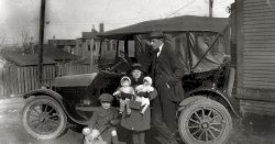 My grandfather (R) Tom I'Anson, my father (L) Tom Jr. and Aunt Jenny. Location probably Victoria BC. Date mid 1920's. Looks like the kids have toys, maybe a Christmas photo. View full size.
I&#039;Anson in VictoriaMy uncle, my mother's half brother, was an I'Anson, born in Victoria in 1922 and lived here all his life. I wonder if it was his family that your grandparents were visiting? Thanks for adding a mystery to Shorpy.com.
Great dolls!She looks very proud of those dolls! A girl after my own heart. Or maybe "before" my own heart, since this was taken 30 years before I was born.
(ShorpyBlog, Member Gallery)